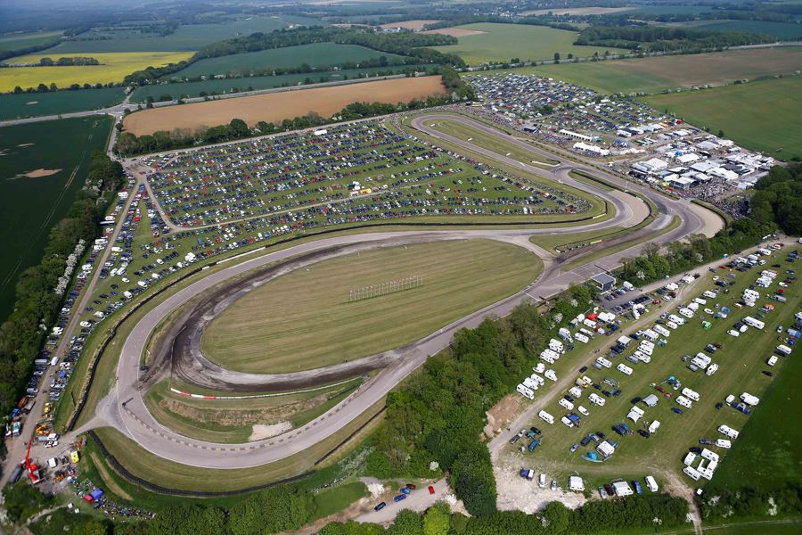 Aerial view of Lydden Hill race circuit, parked cars and spectators