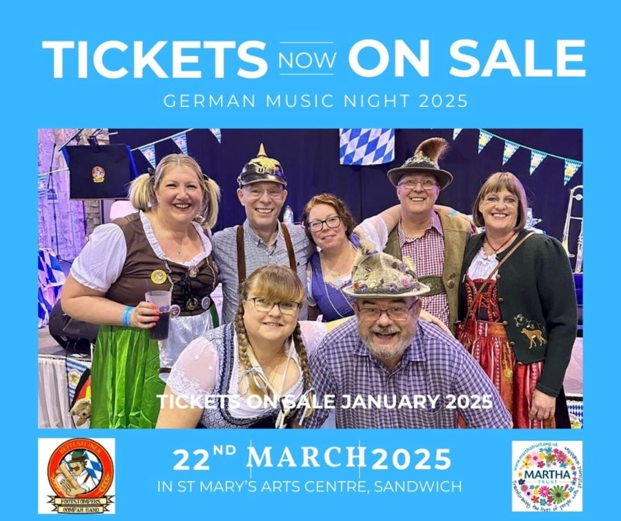 A group photo of the Bettesteiner Footstompers a German Oompah band in German costumes