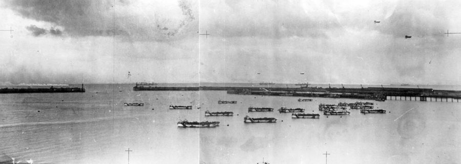 Black and white photo of dummy landing craft in Dover Harbour in 1944.