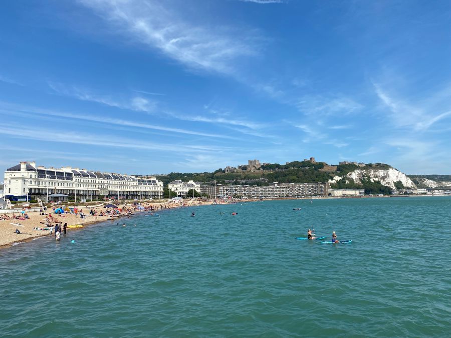 Dover Harbour Beach with the castle and cliffs in the background